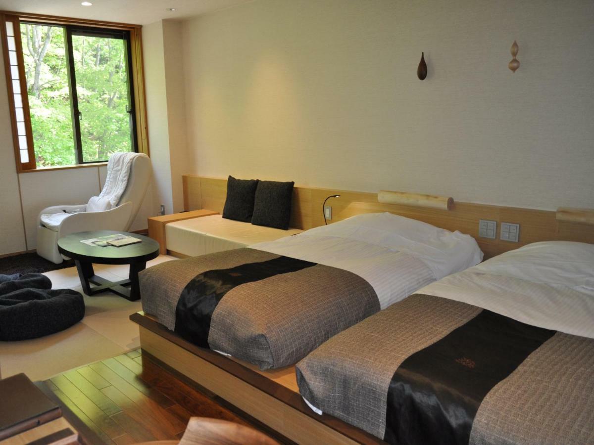 Отель Niseko Konbu Onsen Tsuruga Moku-No-Sho Экстерьер фото