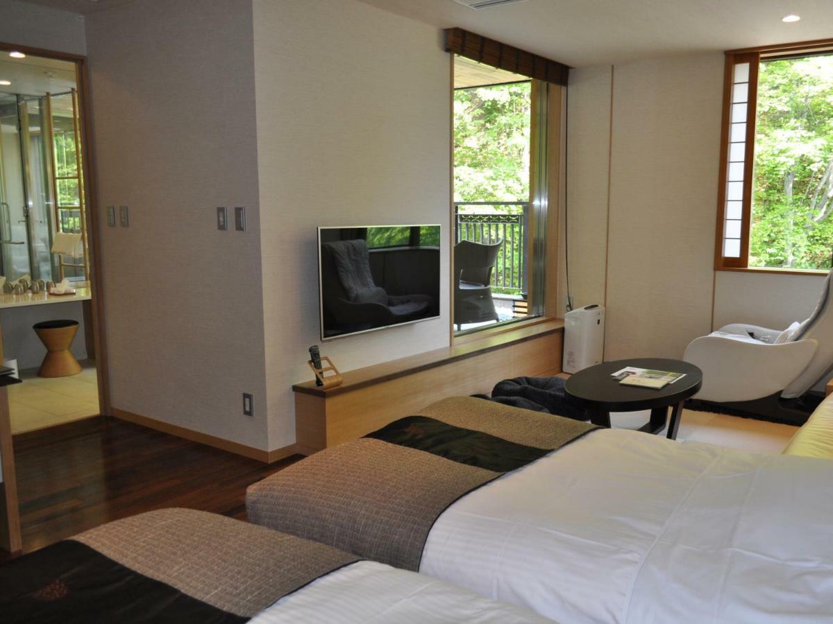 Отель Niseko Konbu Onsen Tsuruga Moku-No-Sho Экстерьер фото