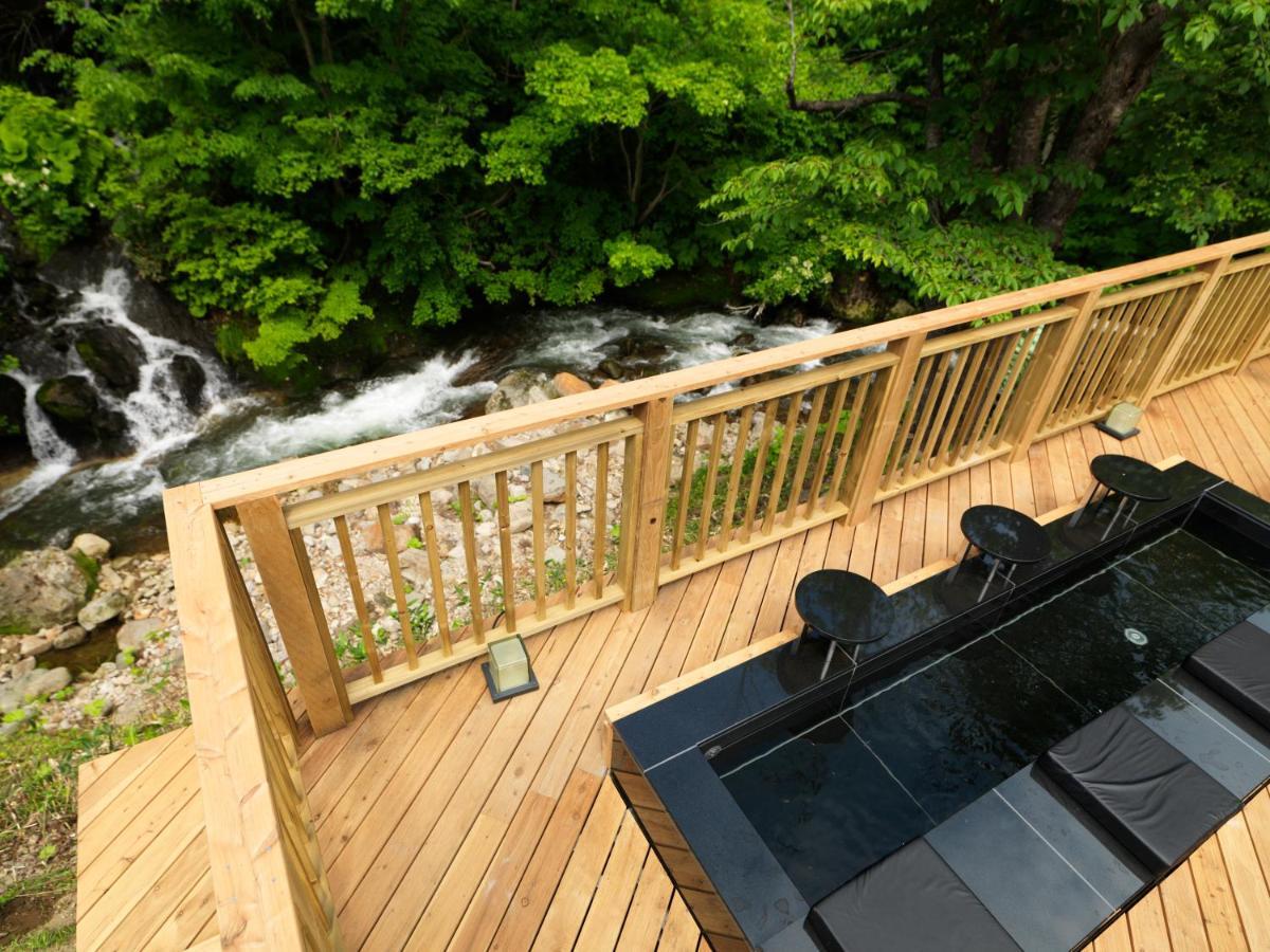 Отель Niseko Konbu Onsen Tsuruga Moku-No-Sho Экстерьер фото